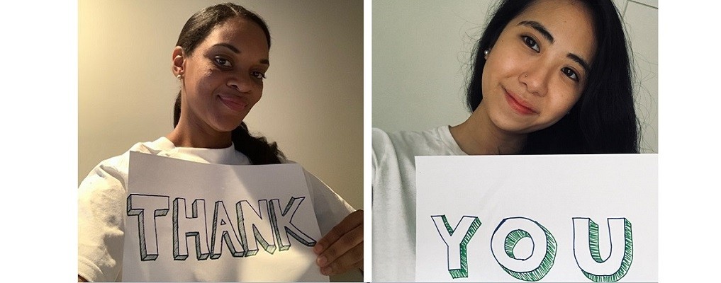 CUIT Employees holding thank you signs