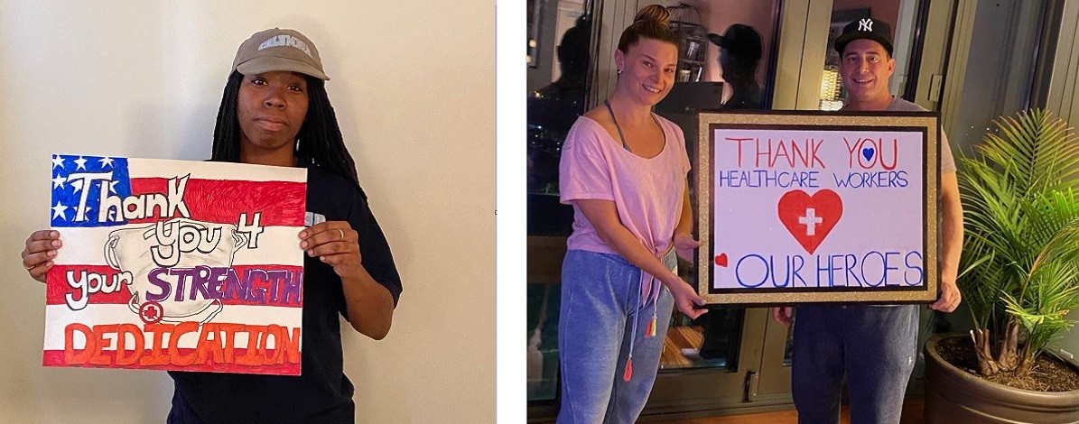 CUIT Employees holding thank you signs