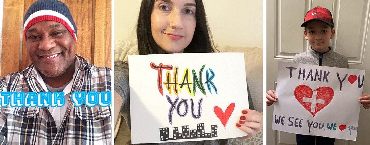 CUIT Employees holding thank you signs
